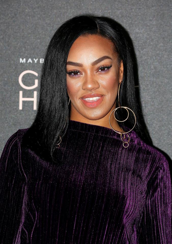  Stooshe star Karis Anderson has wore purple velvet as she joined the girl gang for the evening