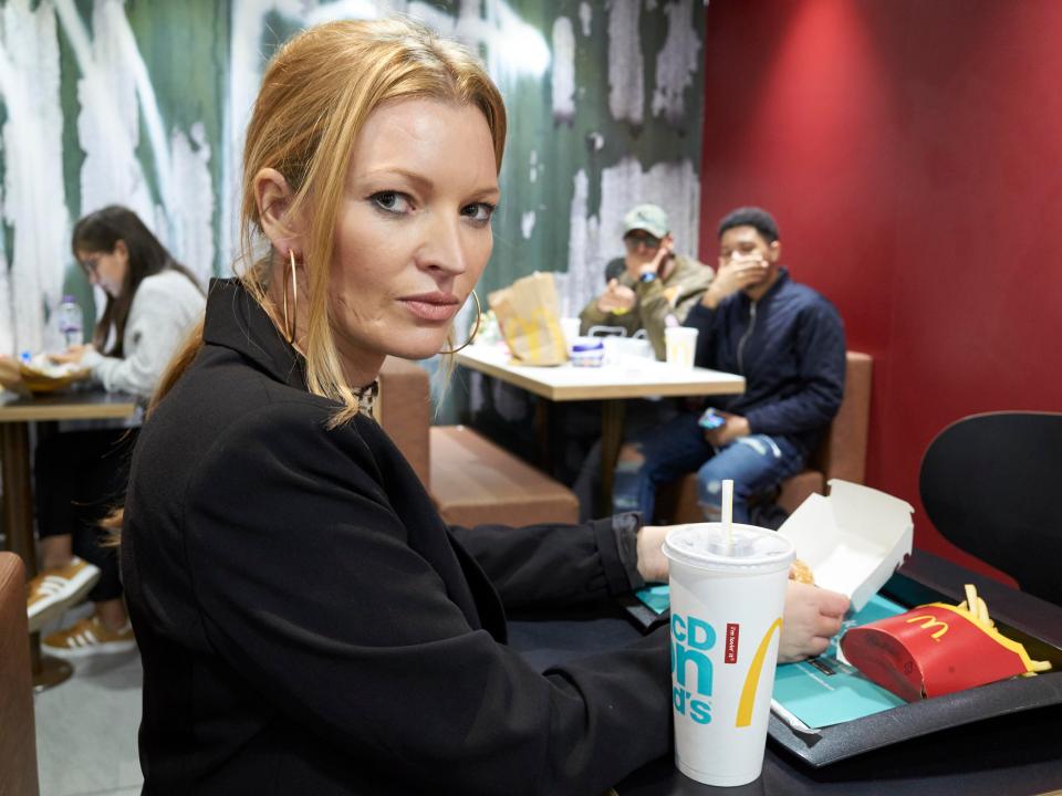  Denise breaks supermodel rule and tucks into a McDonalds meal