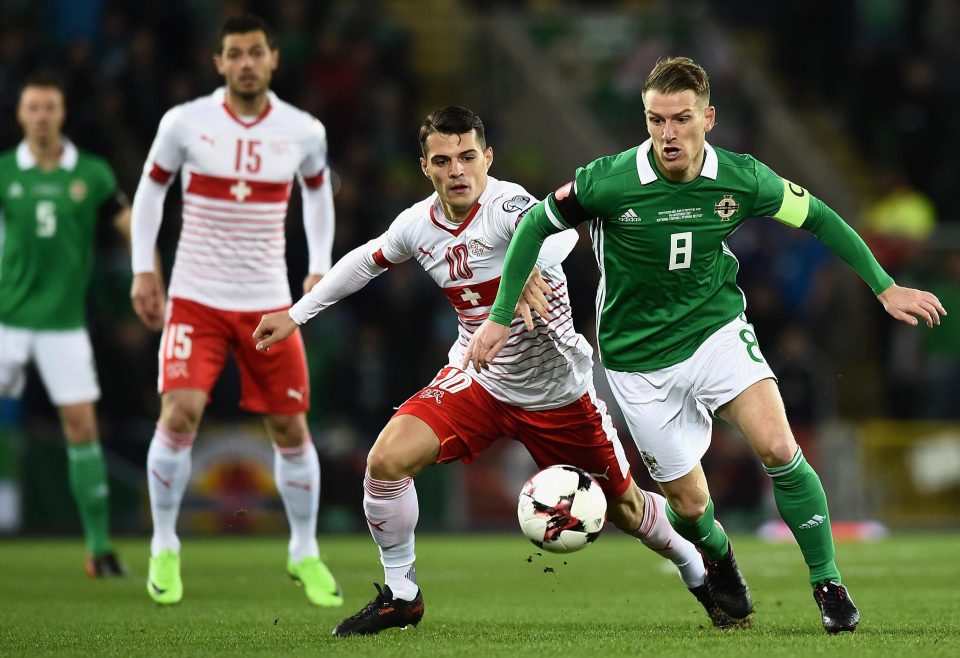  Southampton star Steven Davis and Arsenal ace Granit Xhaka vie for the ball in the first half