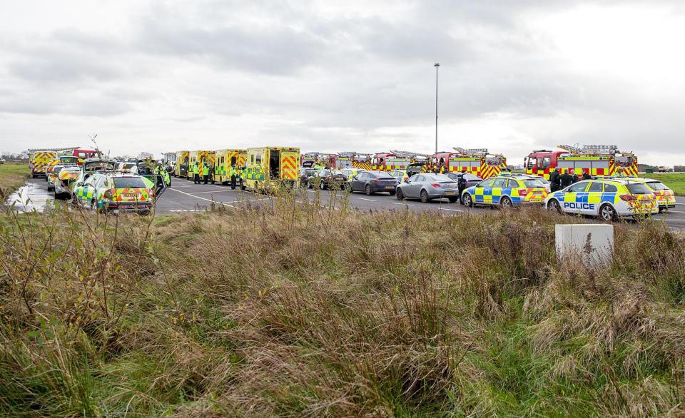  Dozens of emergency vehicles descended on the runway to help the stricken jet