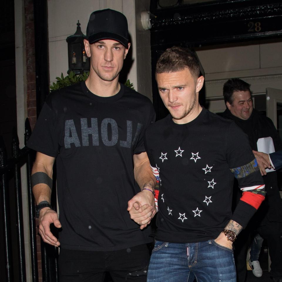  Joe Hart and Kieran Trippier hold hands leaving a London nightclub