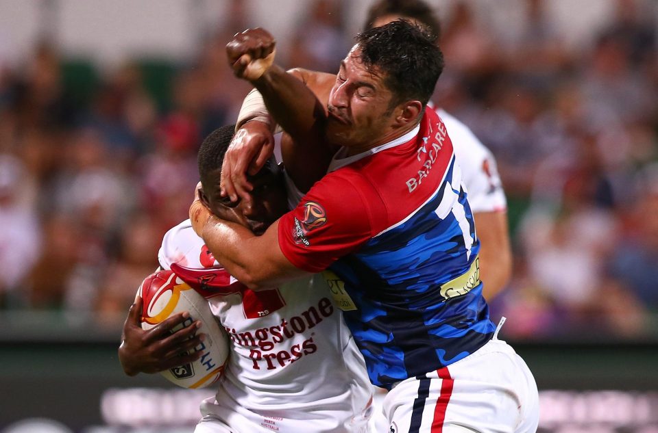  Jermaine McGillvary crashes through the France defence