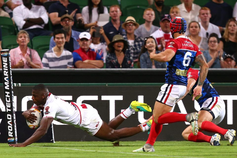  Jermaine McGillvary goes over for one of his two tries