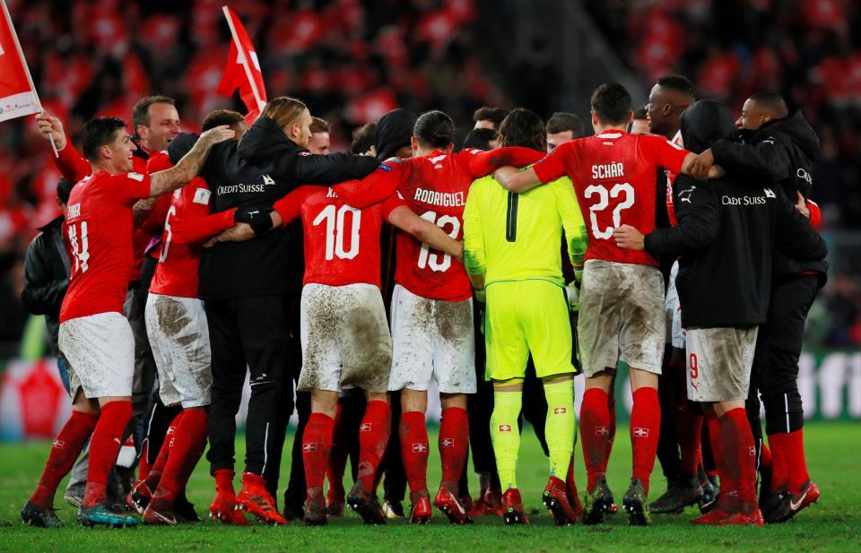  The Switzerland squad celebrate the victory after the final whistle