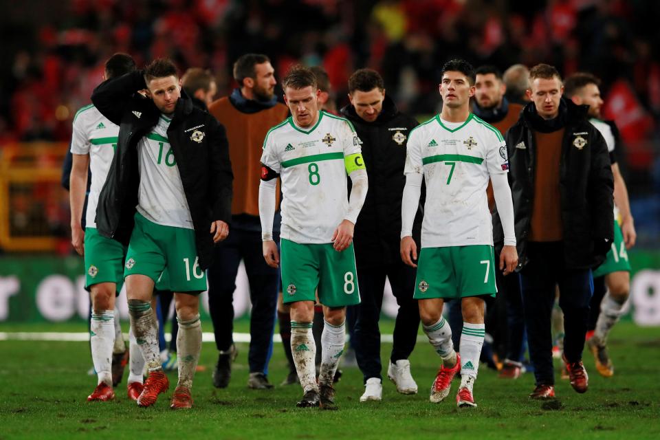  Northern Ireland's Steven Davis and Jordan Jones look dejected after the game