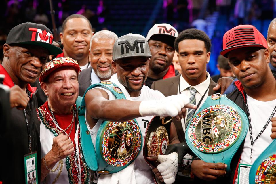  Floyd Mayweather Sr, Rafael Garcia and DeJuan Blake after Mayweather's win over Andre Berto in 2015