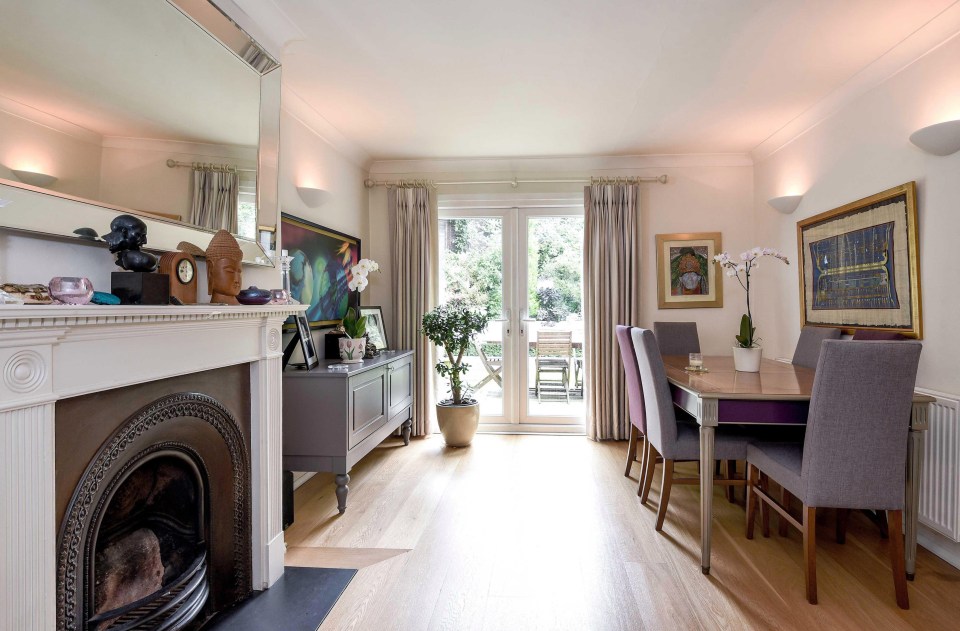 Patio doors allow light to flood into the living room of the Hampstead home