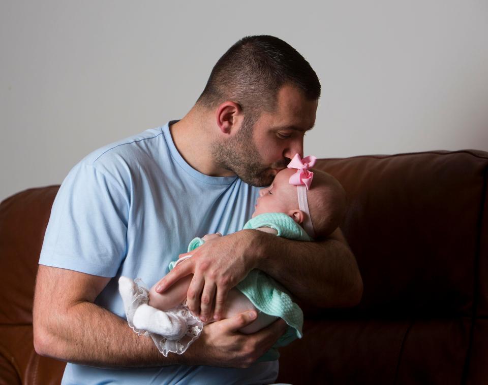  Dad-of-four Brett, pictured with baby daughter Tilly, says he may never have met her if not for their selfless actions