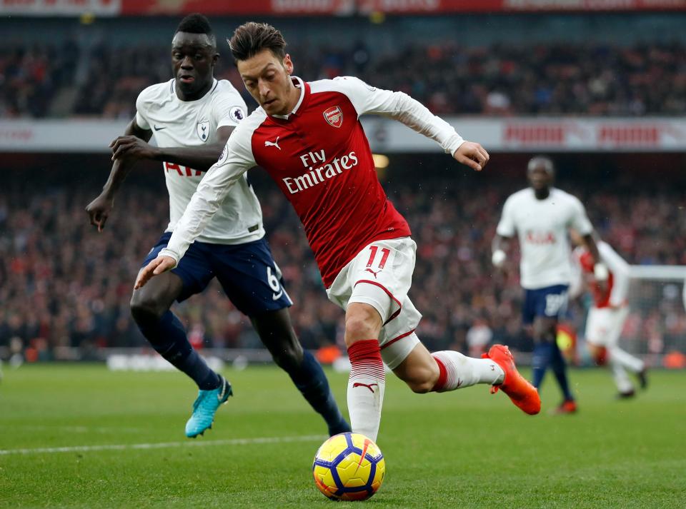  Mesut Ozil has been praised for tracking back for Arsenal against Tottenham