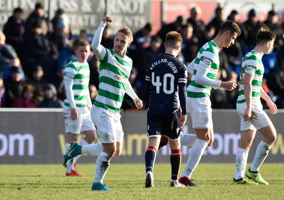  Leigh Griffiths celebrates scoring the winner for Celtic and extending their lead briefly over Aberdeen