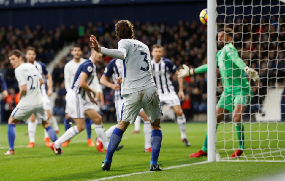  Marcos Alonso squeezes in Chelsea's third before half-time at West Brom