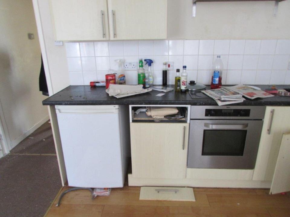  Food and cooking equipment was left all over the counter with rubbish on the floor