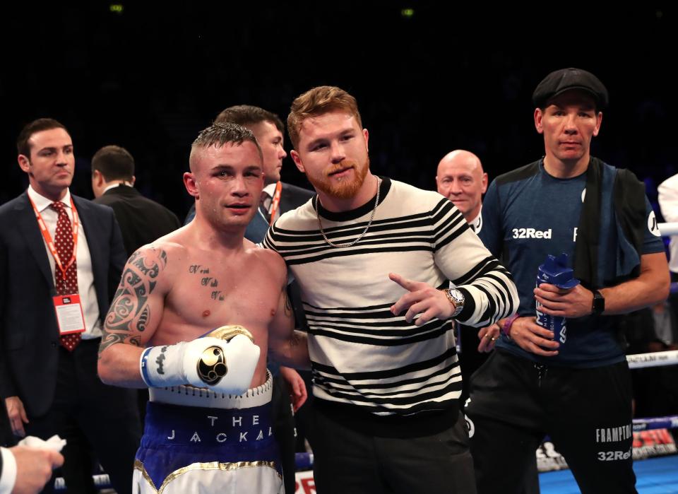  Saul 'Canelo' Alvarez poses for the camera next to Carl Frampton at the end of the fight