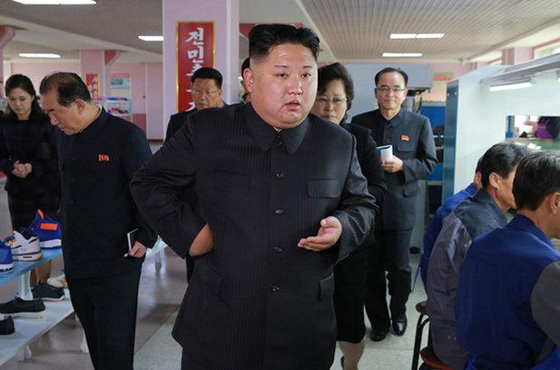  Kim Jong-un's on a recent visit to a make-up factory. Pictures appear to show he has ballooned in weight.