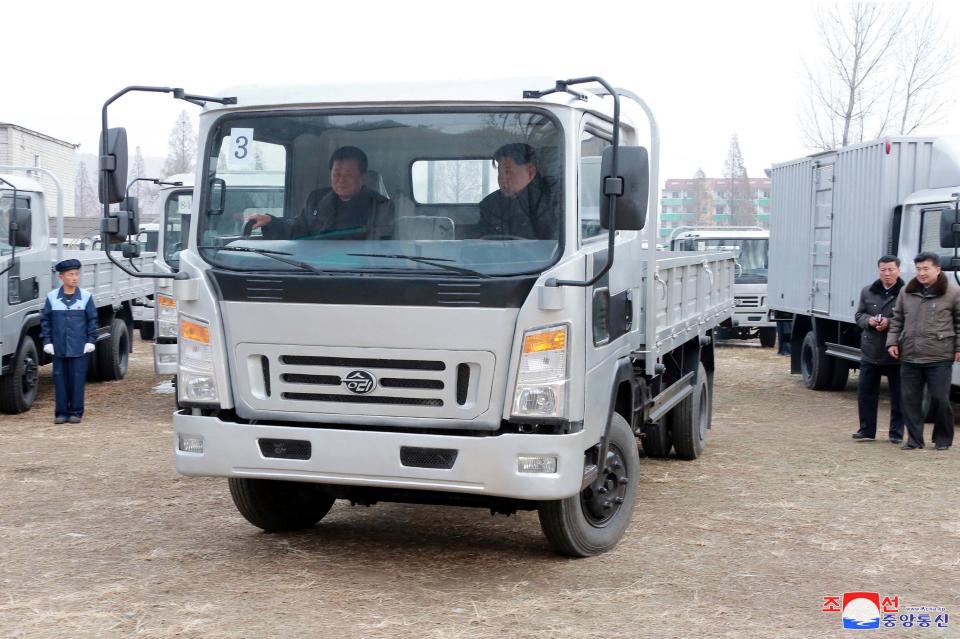  Kim is seen getting behind the wheel of a truck