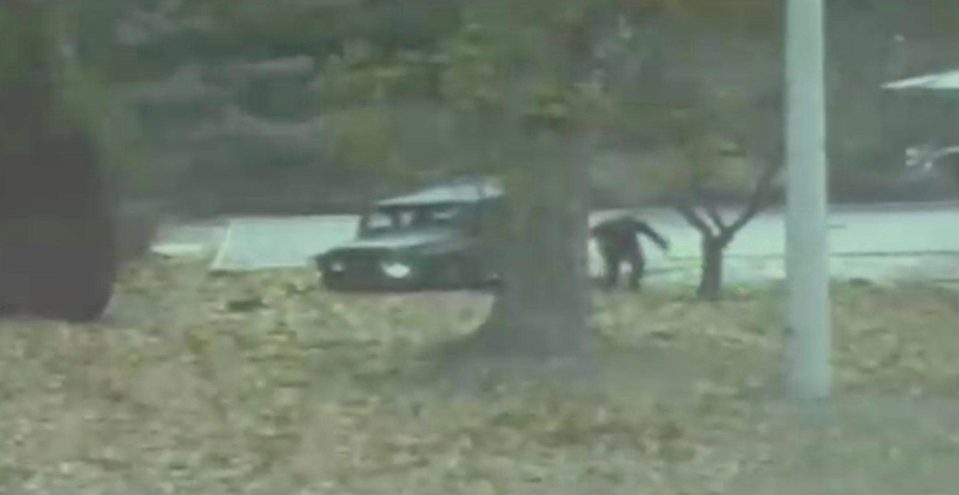  The defector crashes his jeep and runs to freedom as chasing soldiers behind him take aim