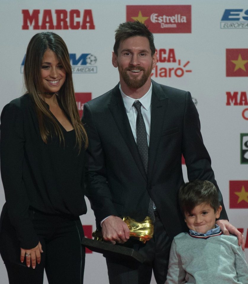  Lionel Messi with partner Antonella Roccuzzo and son Thiago