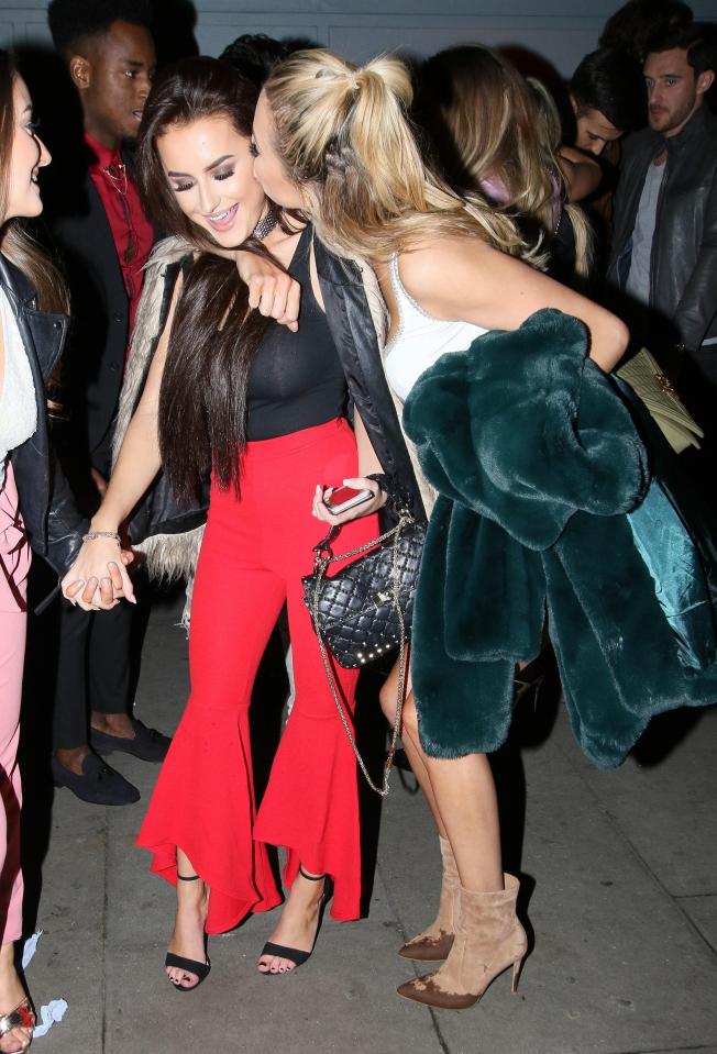  She enjoyed a wild night with Amber Davies, who couldn't be missed in her stylish red trousers