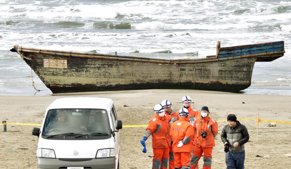  A wooden boat containing the remains of eight bodies was discovered on a beach in northern Japan