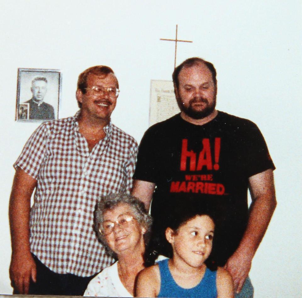  In this snap, aged around 10, she poses with her uncle Fred, grandma Doris and dad Thomas