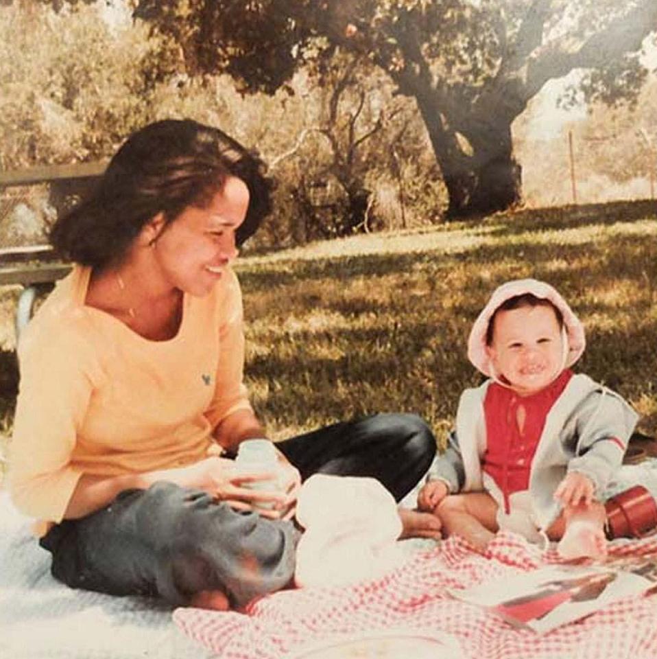  Here she poses with her mother Doria on a trip to Rwanda