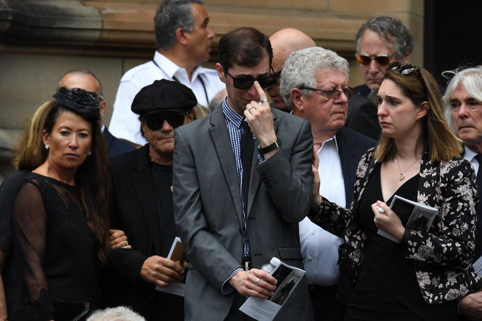  Johnson and other mourners were in tears at the rock legend's farewell