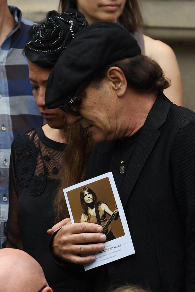  Former AC/DC singer Brian Johnson in tears today at the funeral of guitarist Malcolm Young in Sydney