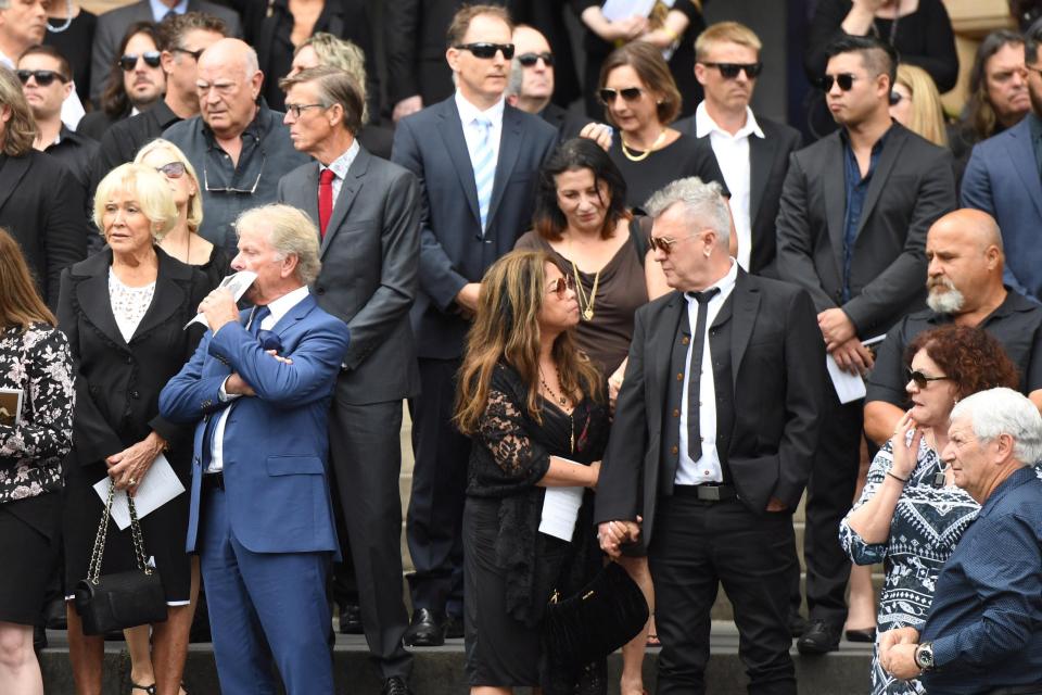  Scottish-Australian rocker Jimmy Barnes, centre right with his wife Jane, paid tribute to their late pal