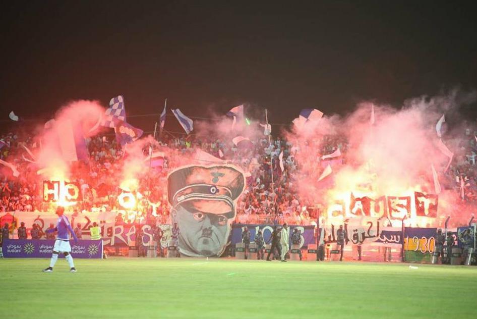  Pictured is the sick Hitler banner unfurled on the side of the Sudanese football match