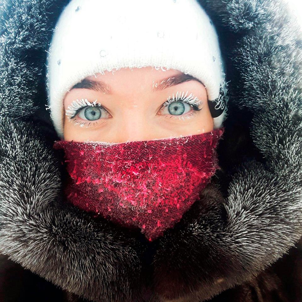  In Siberia, a real fur hat and coat warm like nothing else, but a balaclava under a normal hat works pretty well, too.