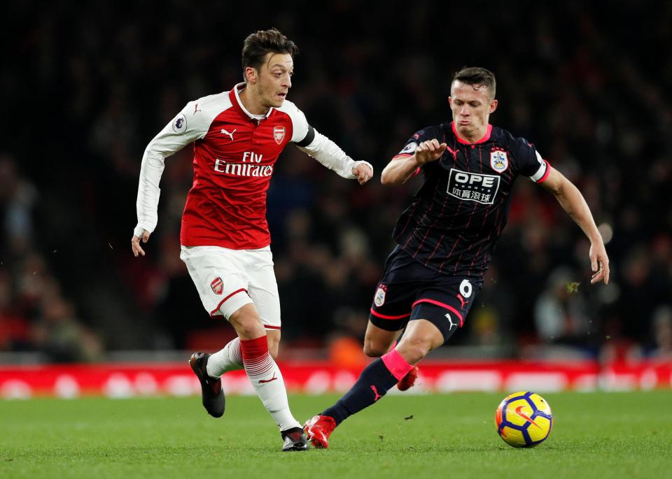  Mesut Ozil helped track back as well as provide in attack for Arsenal