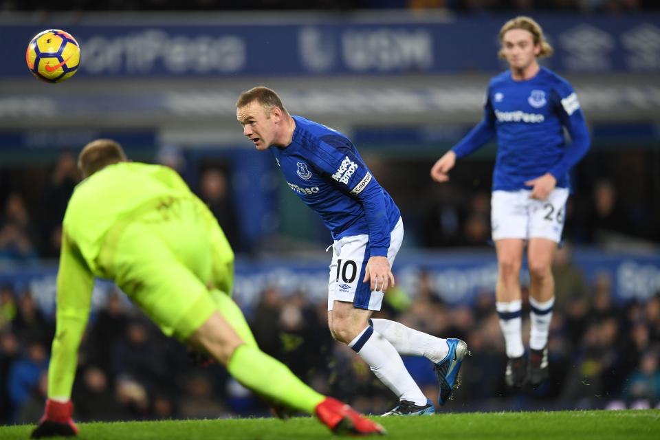  Rooney headed home the opener after Joe Hart saved his penalty