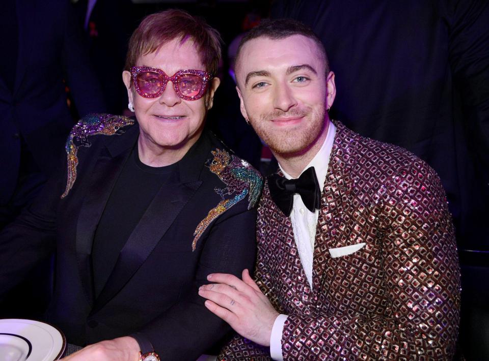  Sam Smith took a snap with the flamboyant Sir Elton at Wednesday's bash