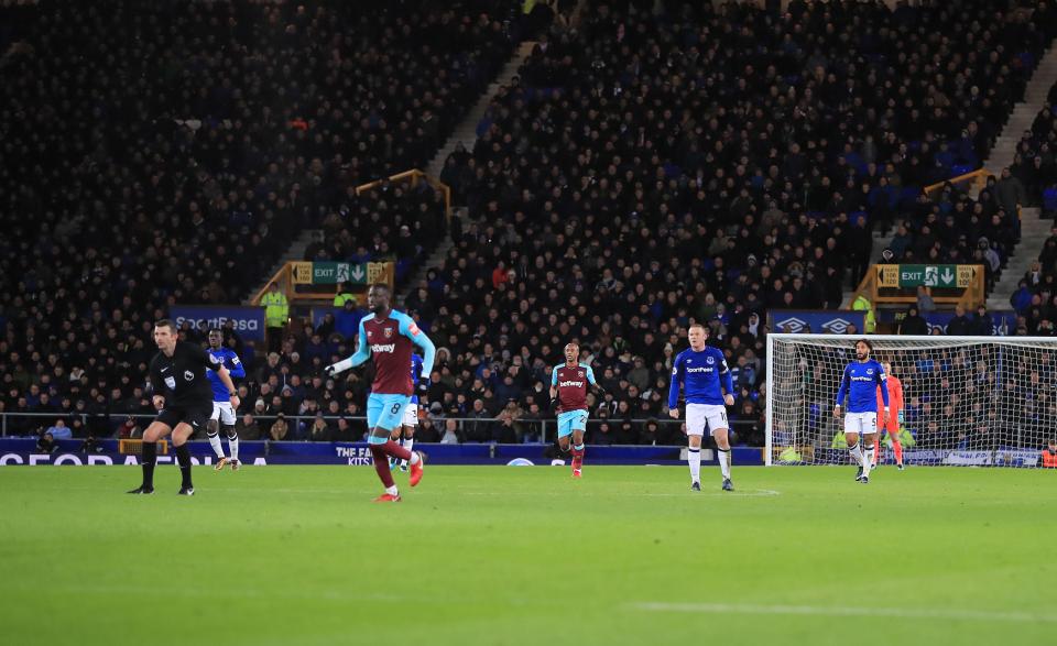  Rooney drilled the ball over Hart's head for one of the best goals of his career