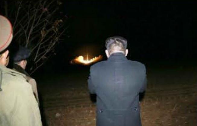  Kim Jong-un watches on as his new Hwasong-15 rocket takes flight