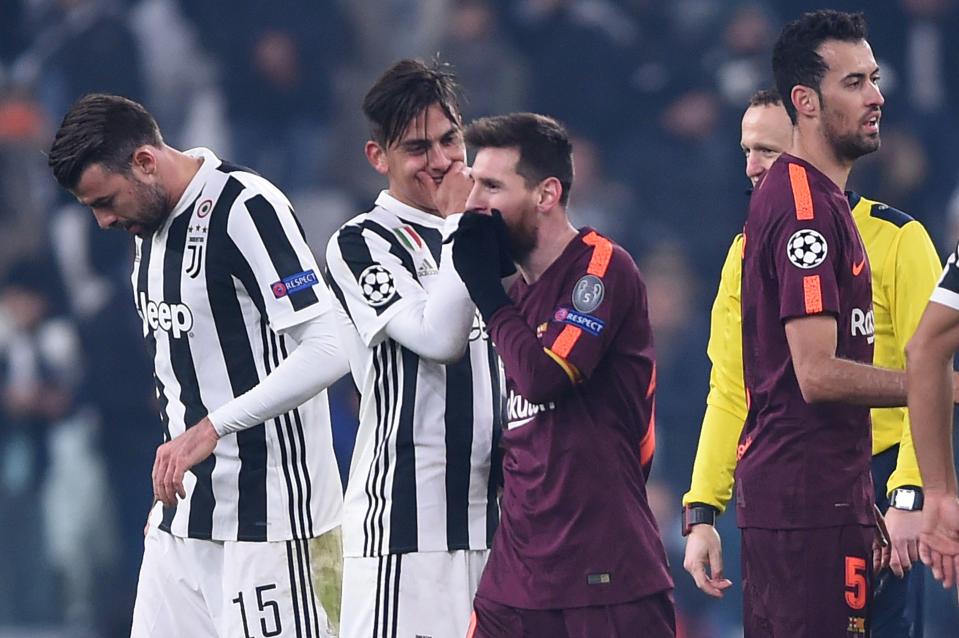  Lionel Messi chats with Argentina teammate Paulo Dybala when Barcelona faced Juventus