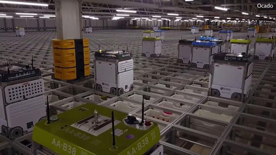  The robots work alongside 200 human employees at the company's new warehouse