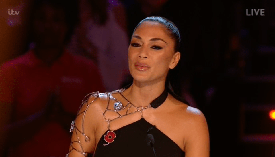  Nicole Scherzinger wore her poppy on what seemed to be the wrong side