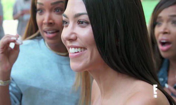  Kourtney looks so pleased when she hears her sister's news