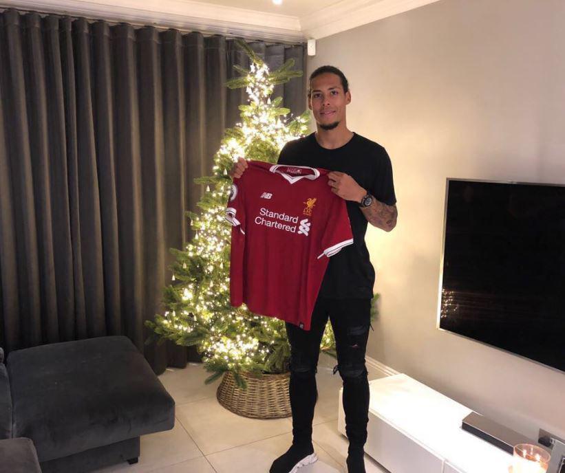  Virgil van Dijk shared a picture of himself holding a Liverpool shirt