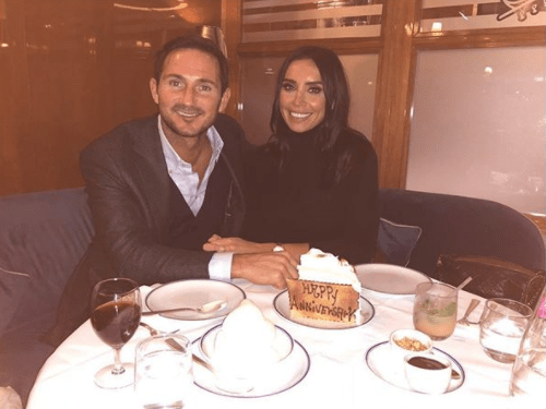 Christine and Frank Lampard cuddle up for a snap during their special anniversary meal