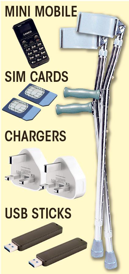 A tiny mobile, chargers and sim cards were found inside the hollow shaft, with USBs in the handle