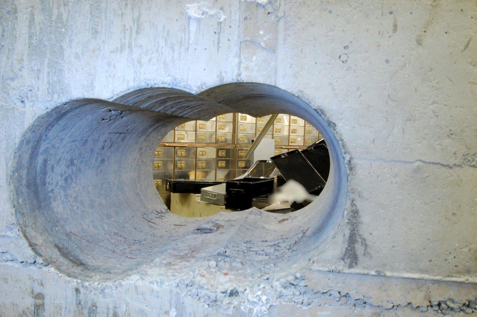 A gang of old-time crooks bored their wait through 50cm of concrete to get into the room