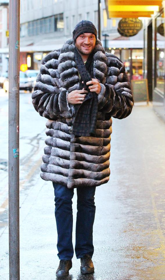  Tyson Fury models his £9,000 chinchilla fur coat