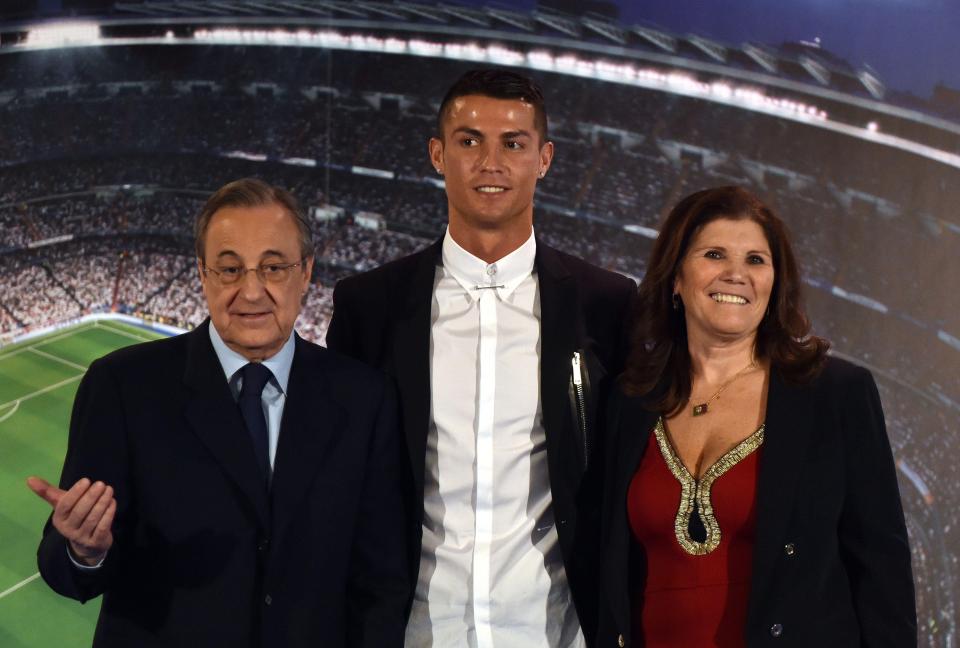  Ronaldo with Real Madrid club president Florentino Perez and his mother