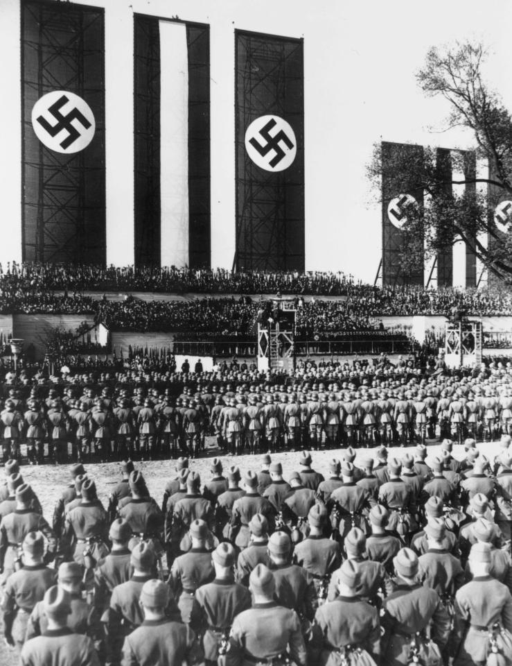  Massed ranks of German soldiers at the Tempelhof airfield to listen to Hitler's speech on 1st May 1934