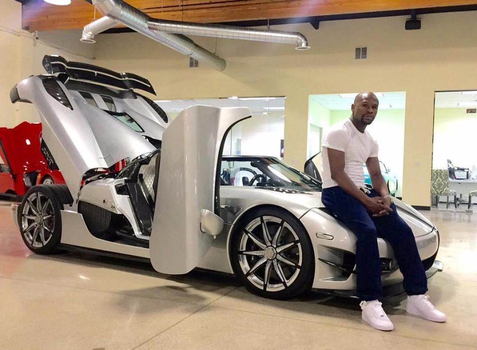  Floyd Mayweather sits atop his £3.6 million Koenigsegg Trevita