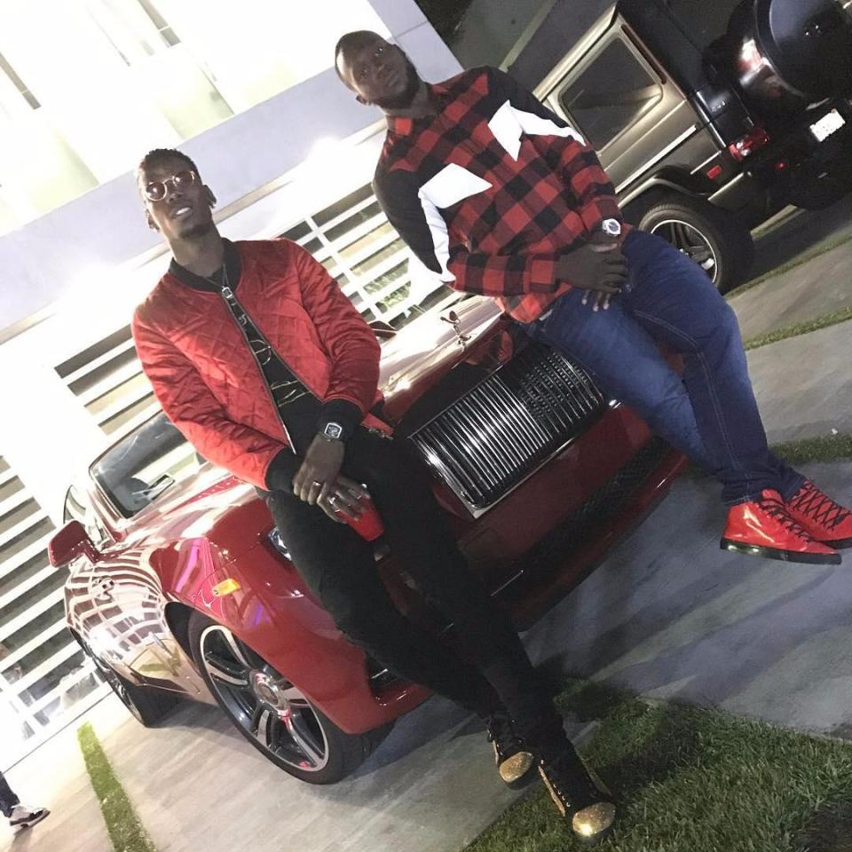  Romelu Lukaku strikes a pose with his fashion-forward thinking mate Paul Pogba