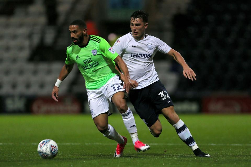  Preston's Josh Earl chases down Cardiff's Liam Feeney