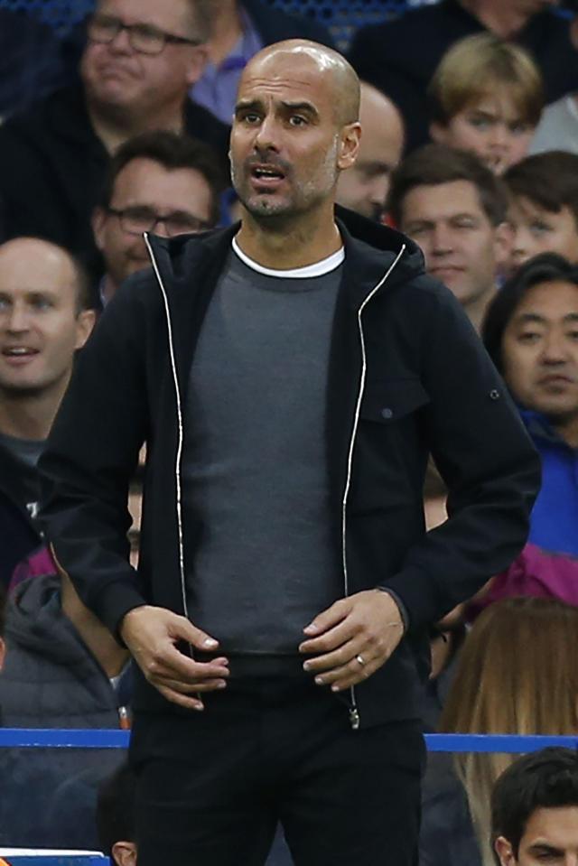  Pep Guardiola has been removing the Stone Island badges from his clothing